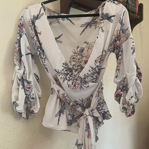 Floral print blouse.